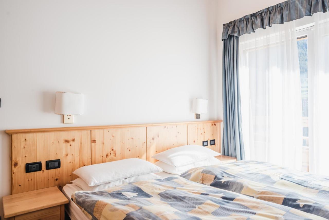 Residence Dolomia ポッツァ・ディ・ファッサ エクステリア 写真